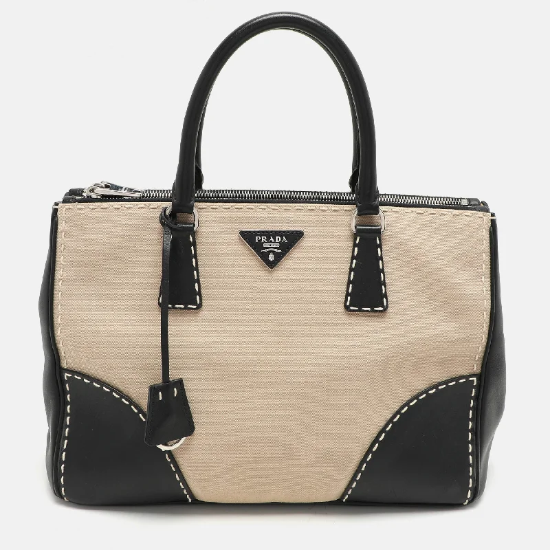 Handle bags with vintage clasps for nostalgia -Prada Beige Canvas And Leather City Stitch Double Zip Tote