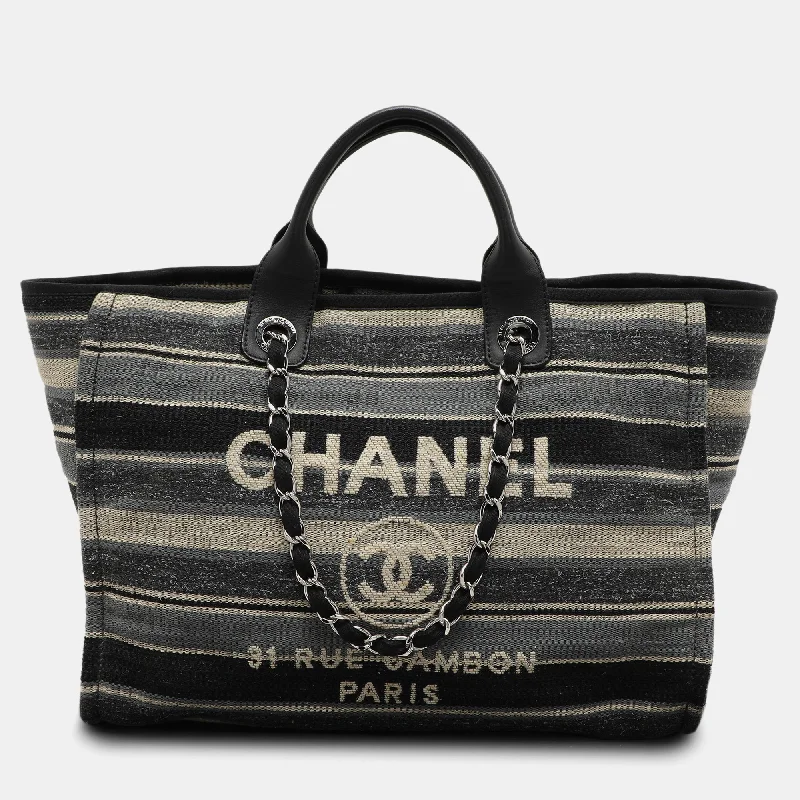 Handle bags with chevron designs for trend -Chanel Grey Striped Canvas And Leather Large Deauville Shopper Tote