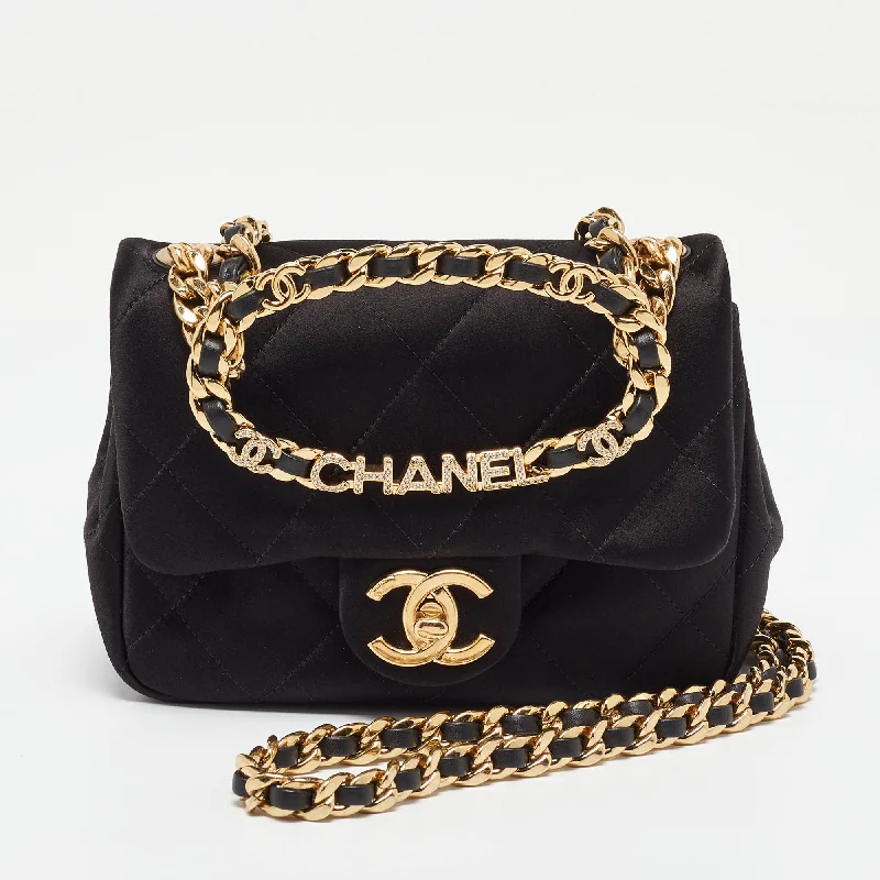 Handle bags with subtle embroidery for detail -Chanel Black Quilted Satin Top Handle Flap Bag