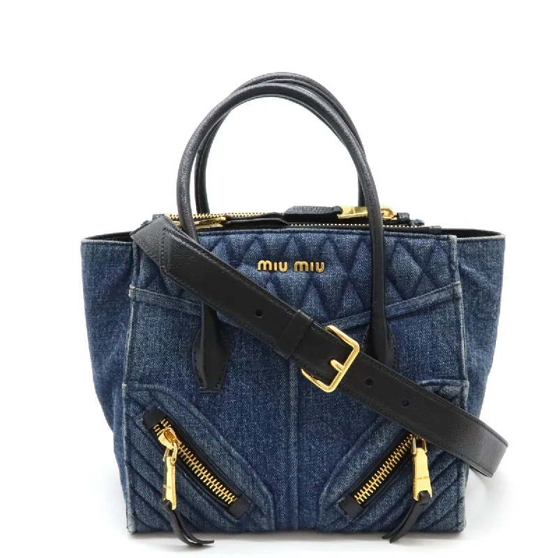 Handle bags with vibrant colors for boldness -Miu Miu Denim Leather Biker 2WAY Handbag