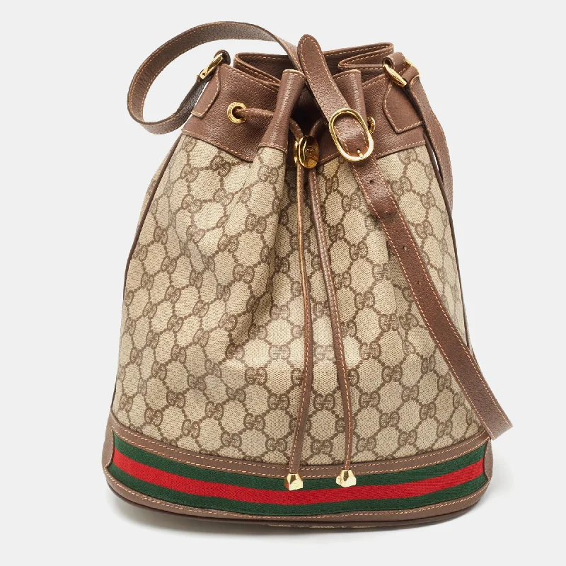 Handle bags with sleek silhouettes for fashion -Gucci Beige/brown Gg Supreme Canvas And Leather Ophidia Bucket Bag