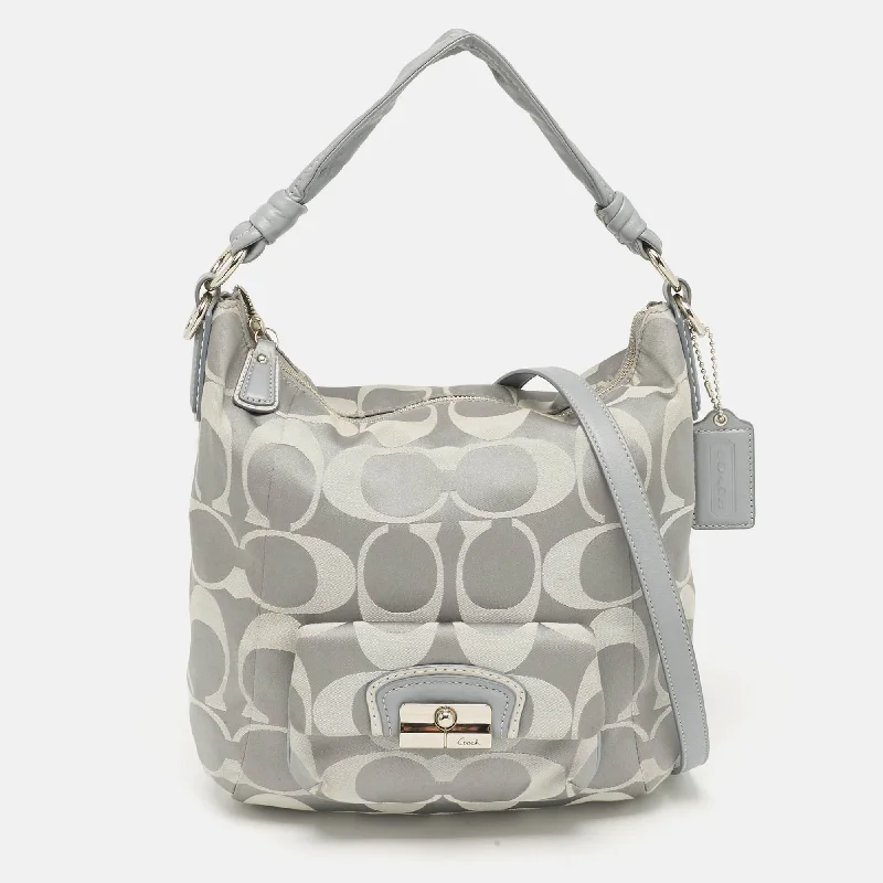 Small handle bags perfect for quick trips -Coach Grey Signature Fabric And Leather Kristin Hobo