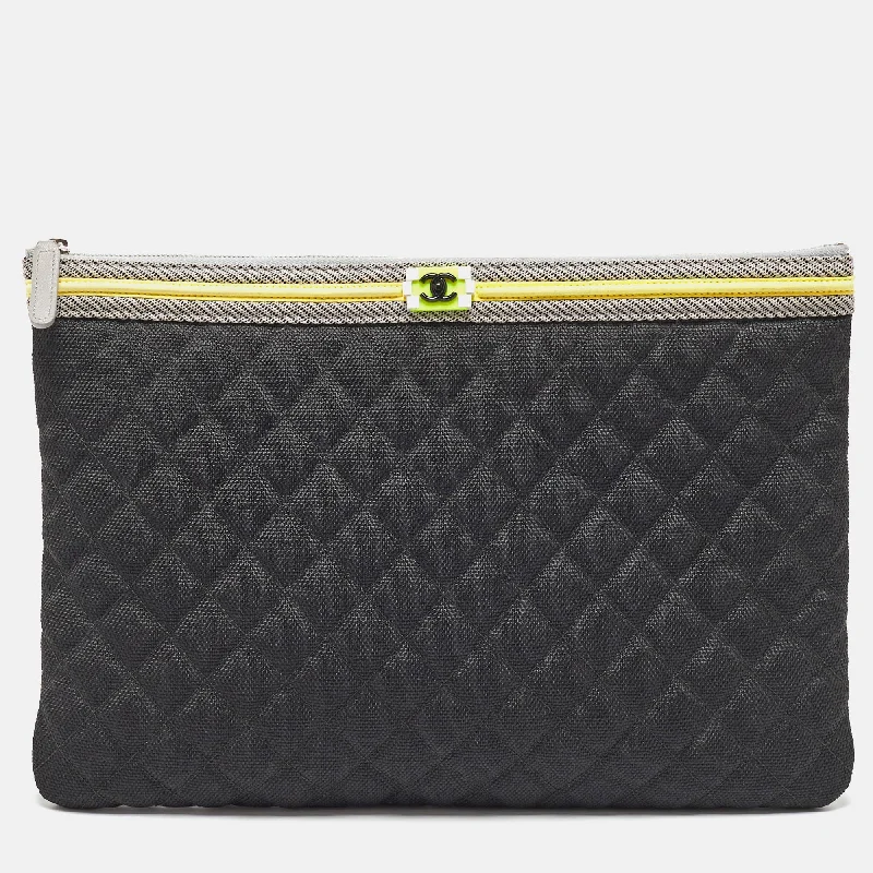 Handle bags with bright accents for pop -Chanel Black/grey Quilted Nylon Fluo Boy O-Case Pouch