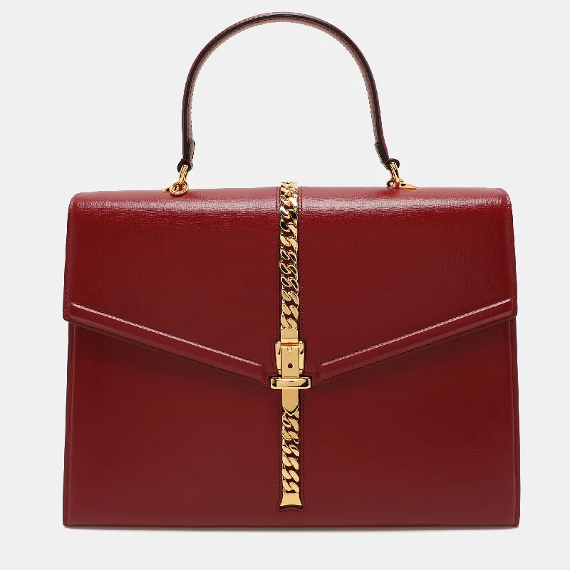 Handle bags with vintage vibes for nostalgia -Gucci Red Leather Sylvie 1969 Top Handle Bag