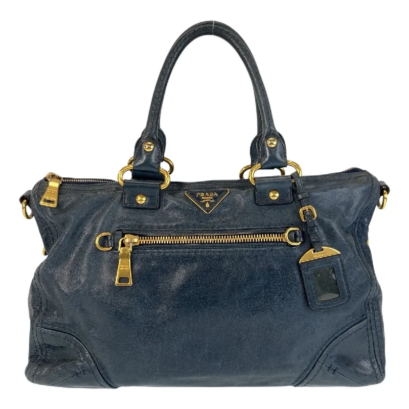 Waterproof handle bags ideal for rainy weather -Prada Blue Leather Triangle Logo Tote Bag