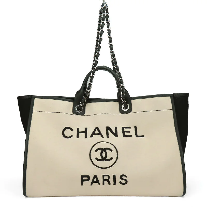 Handle bags with sleek zippers for closure -Chanel Wool Leather Tote Bag Deauville