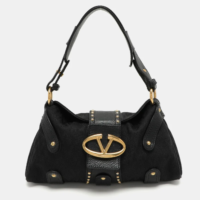 Handle bags with animal prints for flair -Valentino Black Canvas And Leather Embellished Satchel