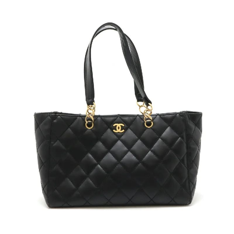 Handle bags with padded straps for comfort -Chanel Leather Wild Stitch Tote Bag