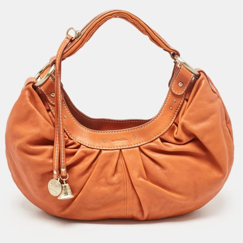 Handle bags with bright florals for cheer -Lancel Orange Pleated Leather Bell Hobo