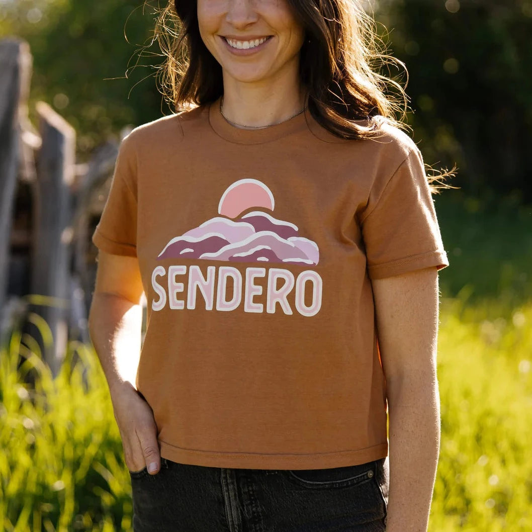 Blue Blouses for Classic -Sendero Provisions Co. Women's Rolling Hills Graphic Cropped T-Shirt in Brown