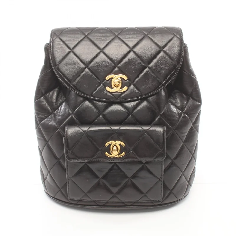 Handle bags with polka dots for fun -Chanel Lambskin Matelasse Backpack Black