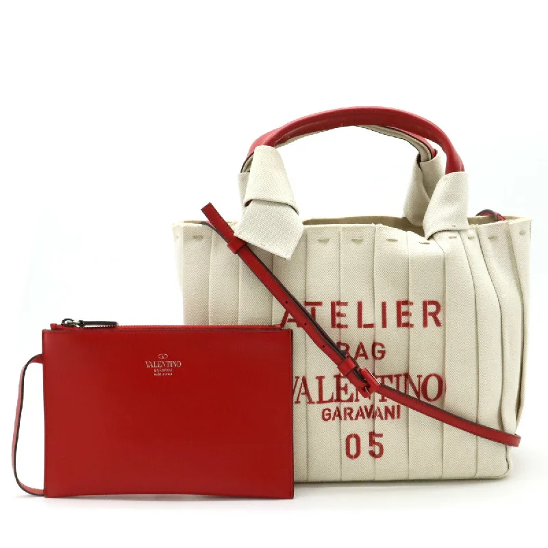 Handle bags with elegant gold-tone hardware -Valentino Atelier Blisse Edition Tote Bag