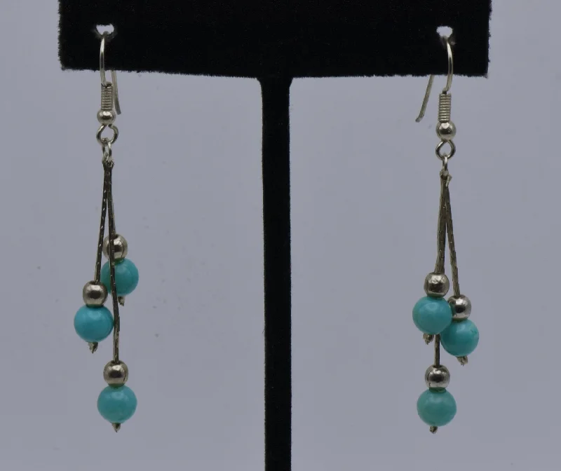 Best hoop earrings with multi-colored gemstones for a vibrant and lively touch-Vintage Imitation Turquoise Bead Dangle Earrings